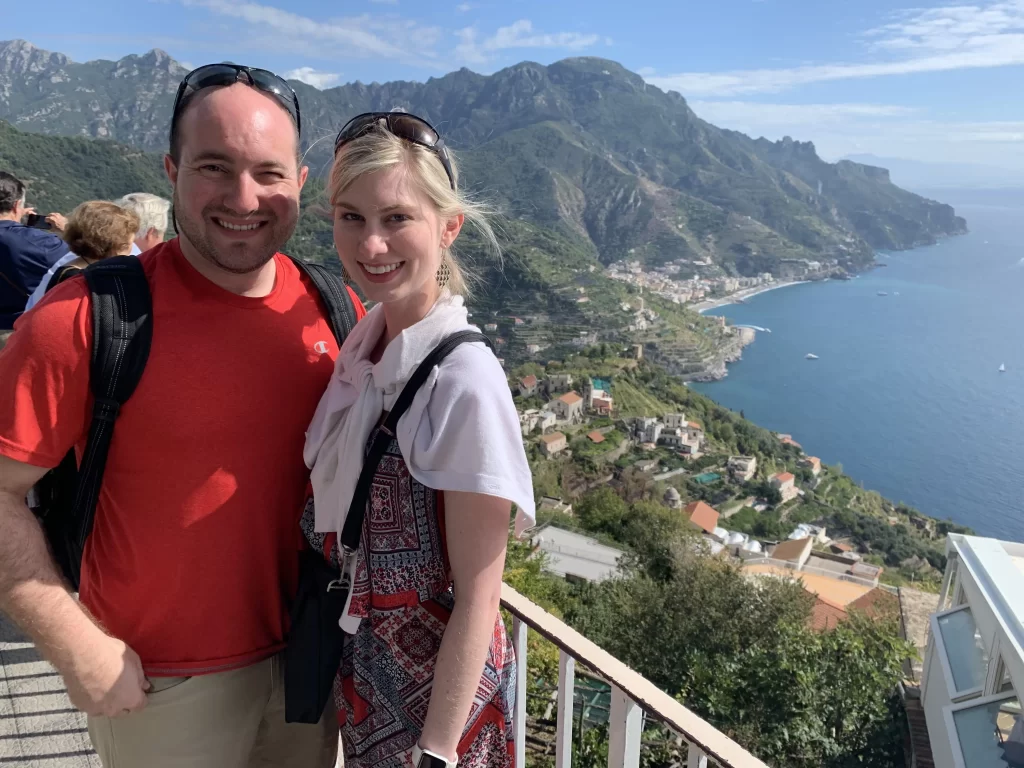 husband and wife standing on Amalfi Coast
