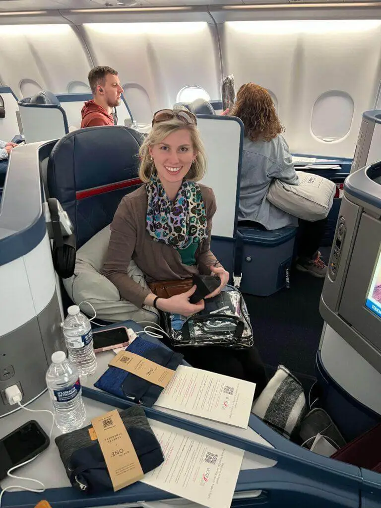 Wife smiling big in the Delta One pod