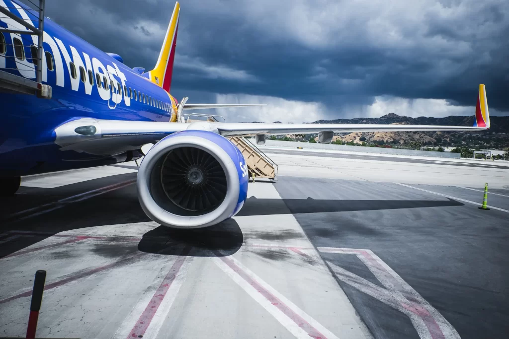 Southwest airplane on the airport tarmac before a storm comes 