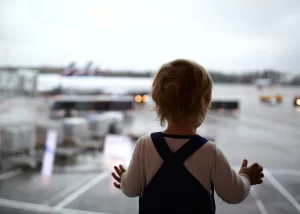 Read more about the article Flying with a Newborn: Expert Tips for a Smooth Journey